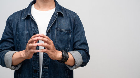 Close up man jeans shirt with watch gesture joy hands isolatedの写真素材
