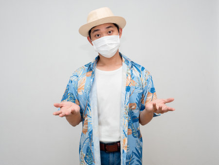 Toursim man wearing hat beach shirt show hand up i dont know isolatedの写真素材