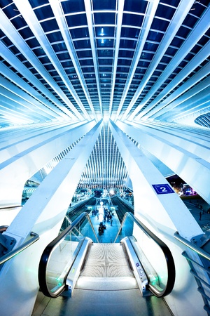 Escalator down to train platformの写真素材