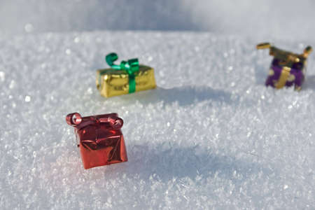 Gifts in the snow during winterの写真素材