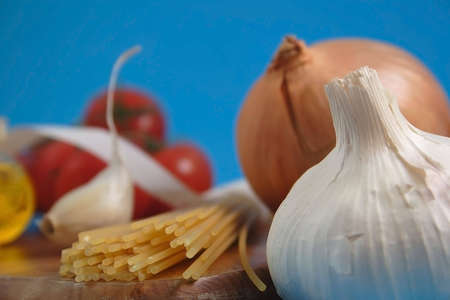 Pastes and tomatos in bunchの写真素材