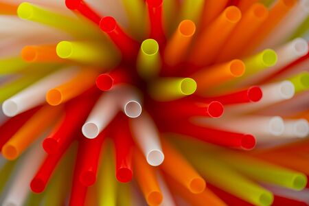 Collection colored drinking straws in blurの写真素材