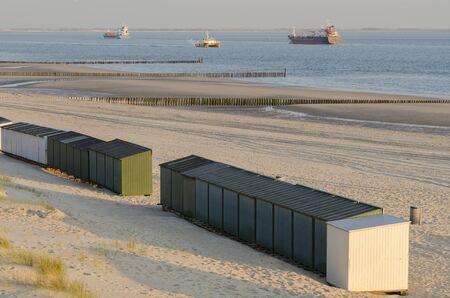 Beach huts on a beach in New Zealand in the South of the Netherlandsの写真素材