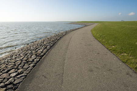 The so-called Wadden dyke on the island of Terschelling in the North Sea in the Netherlandsの写真素材