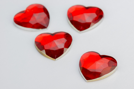 Four hearts in angular red glassの写真素材