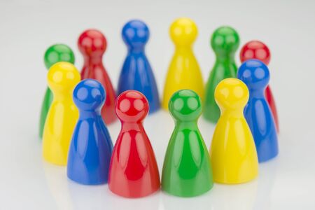 Conceptual game pawns that visualize the concept chain cooperation