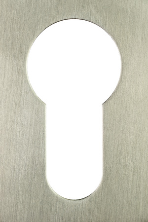 Keyhole features a stainless steel edge looking to a neutral colored background that can be provided with text or otherwiseの写真素材