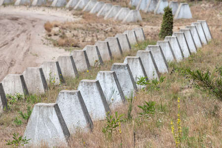 Concrete dragon's teeth as a tank barrier in the Netherlandsの写真素材