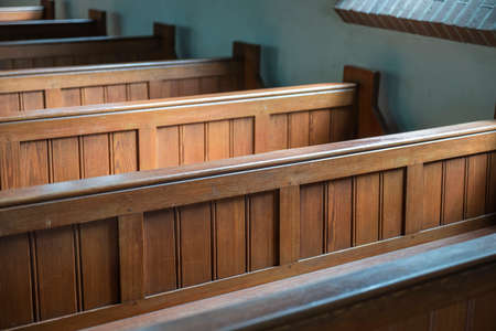 Wooden pews in an old Dutch church in the Netherlands