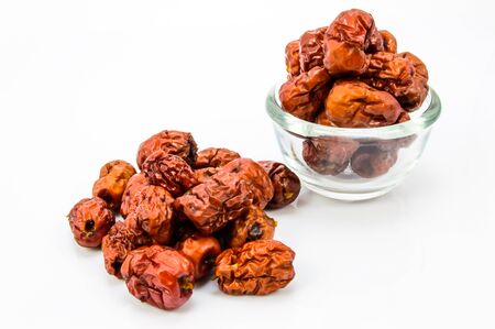 Dried Chinese Jujubes Fruits on white background の写真素材