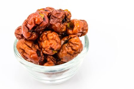 Dried Chinese Jujubes Fruits on white background の写真素材