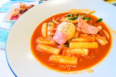 Korean Food, Tukbokki with Boiled egg topping and Kimchi の写真素材