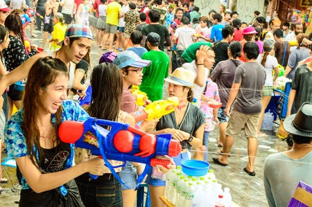 Bangkok - April 13    Crowd of people celebrating the traditional Songkran New Year Festival, on April 13, 2013 at near Khao San Road, Bangkok, Thailand  The new year of Thai or Songkran, celebrations are from 13 to 15 April のeditorial素材