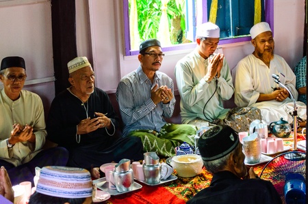 BANGKOK - APRIL 13   Unidentified Musim senior men pray for Allah for ceremony in Graduation of the...