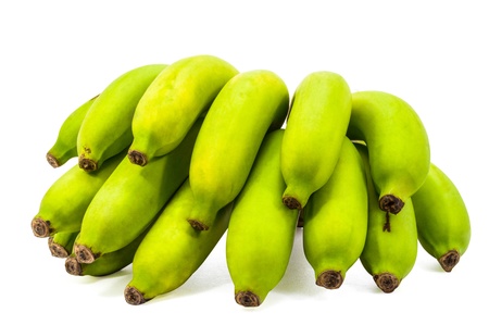 Green Bananas raw bunch isolated on white background の写真素材