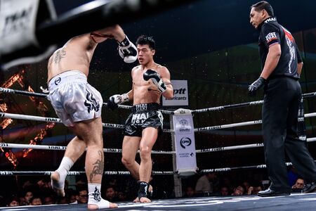 NONTHABURI - JULY 23 : Ying Pengpeng of China and Richard Fanous of Australia in Thai Fight "Proud to be Thai" on July 23, 2016 at West Gate Hall, CentralPlaza WestGate, Bang Yai, Nonthaburi.のeditorial素材