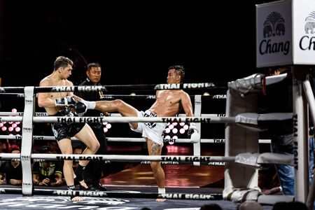 BANGKOK - DECEMBER 24 : Sudsakorn Sor.Klinmee of Thailand and Antoine Pinto of France in THAI FIGHT 2016 on December 24, 2016 at Central World, Bangkok, Thailand.のeditorial素材