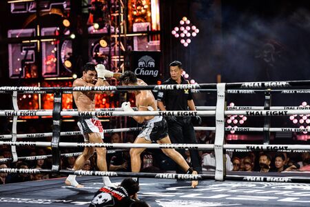 BANGKOK - DECEMBER 24 : Payak-Samui Lukiaoporongtom-Kromsappasamit of Thailand and Bobur Tagaev of Uzbekistan in THAI FIGHT 2016 on December 24, 2016 at Central World, Bangkok, Thailand.のeditorial素材