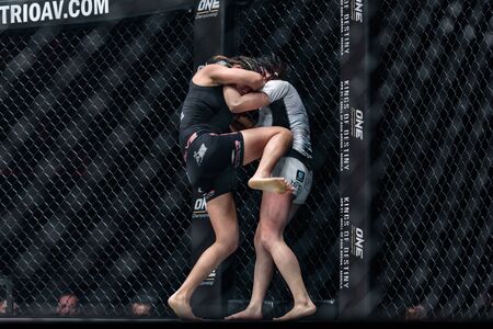 BANGKOK - MARCH 11 : Angela Lee of Singapore and Jenny Huang of Chinese Taipei in One Championship "One : Warrior Kingdom" on March 11, 2017 at Impact Arena, Muang Thong Thani, Bangkok, Thailandの写真素材