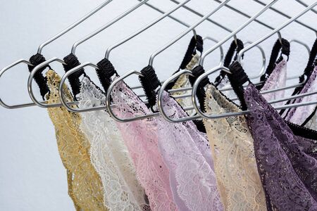 Lace panties on metal hanger. Fashion trendy lace lingerie. Beautiful female underwear.の写真素材