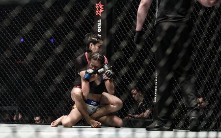 BANGKOK - December 09 : Rika Tiny Doll Ishige of Thailand and Rome The Rebel Trinidad of Philippines in One Championship Warrior of The World on December 09, 2017 at Impact Arena, Muang Thong Thani, Bangkok, Thailandのeditorial素材