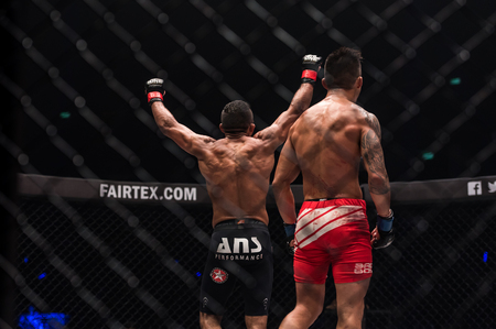 BANGKOK - March 24 : Bibiano Fernandes of Brazil and Martin Nguyen of Australia in One Championship : IRON WILL on March 24, 2018 at Impact Arena, Muang Thong Thani, Bangkok, Thailand.のeditorial素材