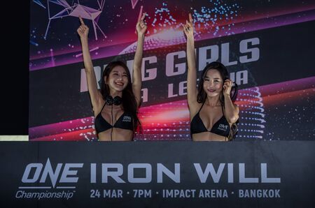 BANGKOK - March 24 : Ring Girl SIENA and LEE JI NA in One Championship : IRON WILL on March 24, 2018 at Impact Arena, Muang Thong Thani, Bangkok, Thailand.のeditorial素材