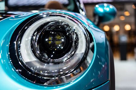 BANGKOK - MARCH 27 : Headlight of Mini Cooper S : Convertible on display at The 39th Bangkok International Motor Show : Revolution in motion on March 27, 2018 in Bangkok, Thailand.のeditorial素材