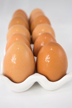Fresh eggs in Ceramic Containersの写真素材