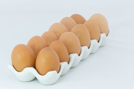 Fresh eggs in Ceramic Containersの写真素材