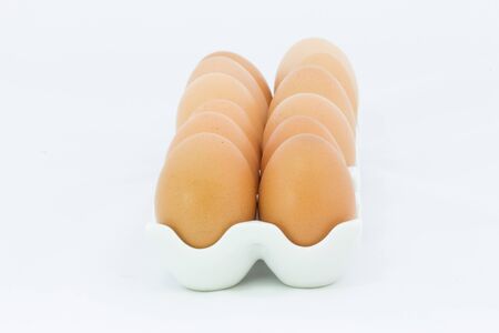 Fresh eggs in Ceramic Containersの写真素材