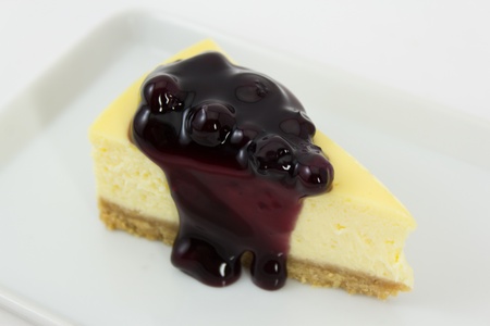 Blueberry cheesecake serve on white plateの写真素材