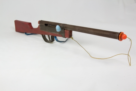 pop-out string wooden toy gunの写真素材
