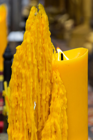 Big candle in Thailand templeの写真素材
