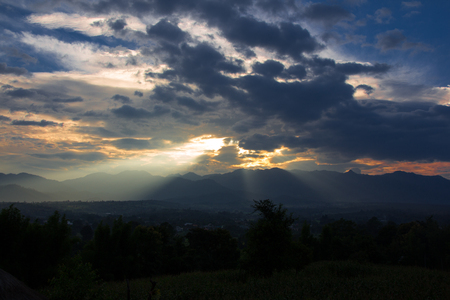 ray of sunshine breaks through the storm cloudsの写真素材