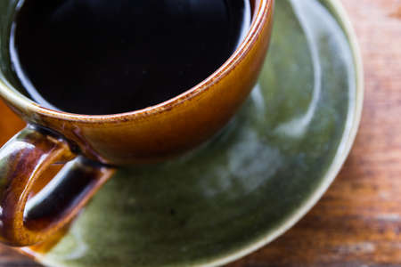 a cup of Espresso coffee on Wooden Tableの写真素材