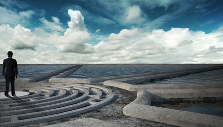 businessman in maze and pathway