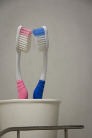 two toothbrush in ceramic glassの写真素材