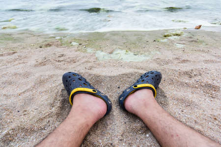leg on the sand beach