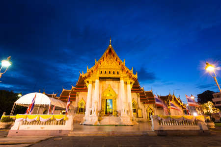 Bangkok,Thailand-July 31,2015:Buddhist monk pray in the evening at  Marble Temple, Wat Benchamabopit Dusitvanaram in Bangkok, Thailandのeditorial素材