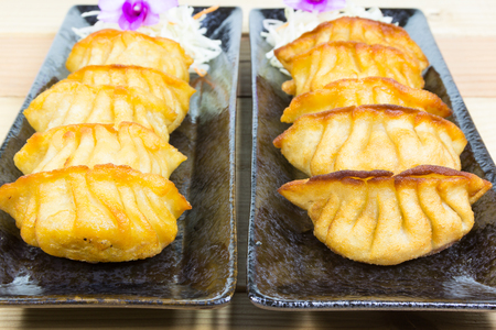 Chinese fried dumpling on plateの写真素材