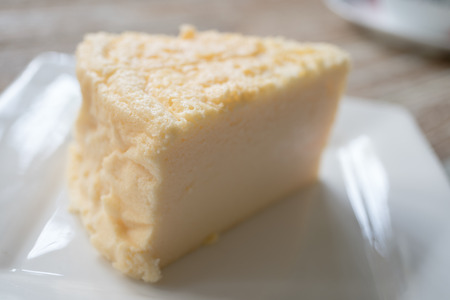 cotton cheese cake on white plate homemade bakeryの写真素材