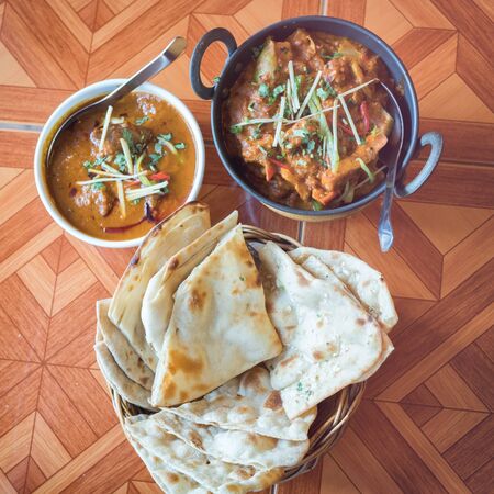 indian food  curry, nan , Sauce on the tableの写真素材