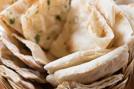 Indian cuisine, variety of roti in basketの写真素材