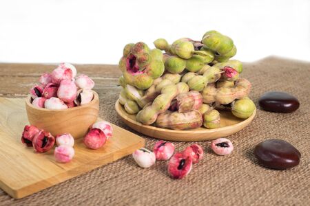 Manila Tamarind fruit in wooden plateの写真素材
