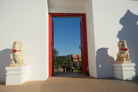 Kanchanaburi, Thailand - January13,2017 : Malika R.E.124 The Siamese Ancient Town, the big red entranceのeditorial素材