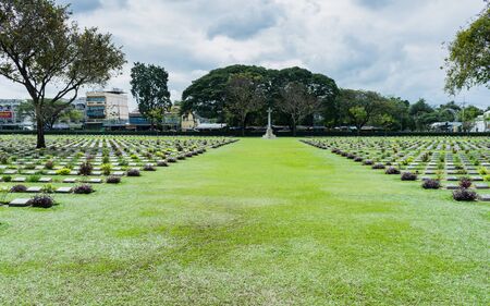 Kanchanaburi, Thailand - January 11,2017 : Kanchanaburi War Cemetery in Thailand. The cemetery contains the remains of 6,982 Allied prisoners of war the Second World Warのeditorial素材