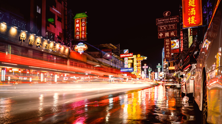 Bangkok, Thailand - DEC 26, 2017: Colorful of lights form cars and restaurant on Yaowarat road, Many street food and shopping market at night in China town.のeditorial素材