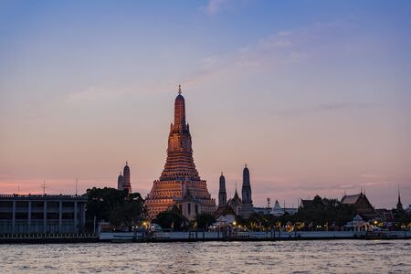 Wat Arun Temple at sunset  twilight with floating lanterns in bangkok,Thailand.の写真素材