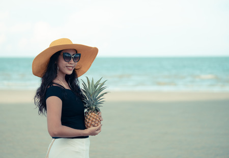 Young woman relaxing on the beachの写真素材